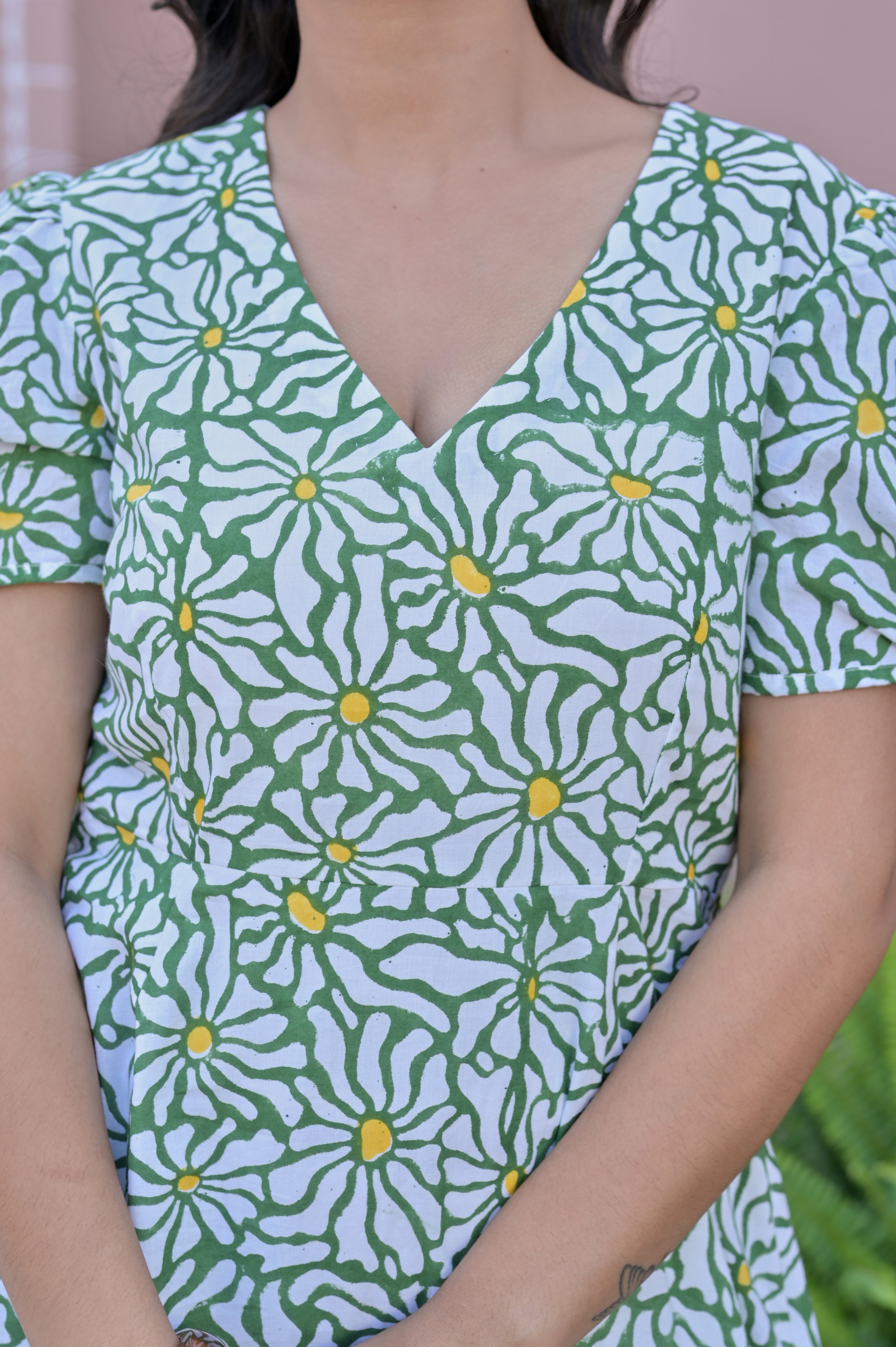 The Emerald Garden Midi: A lush, vibrant green with a classic silhouette